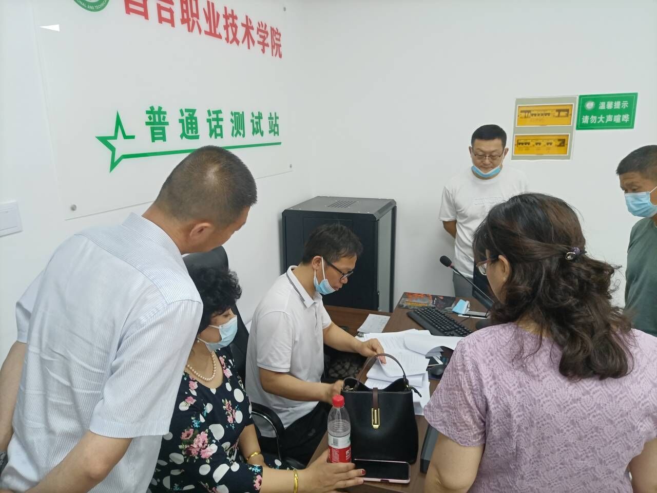 自治区教育考试院专家评审组与州教育局语委领导来我院指导工作